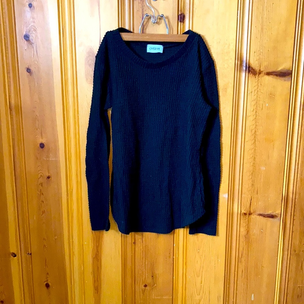 Black knit long sleeve shirt. Size Medium